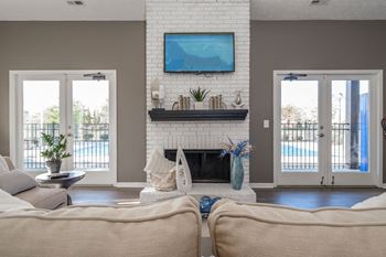 Sterling Park apartments social lounge with fireplace